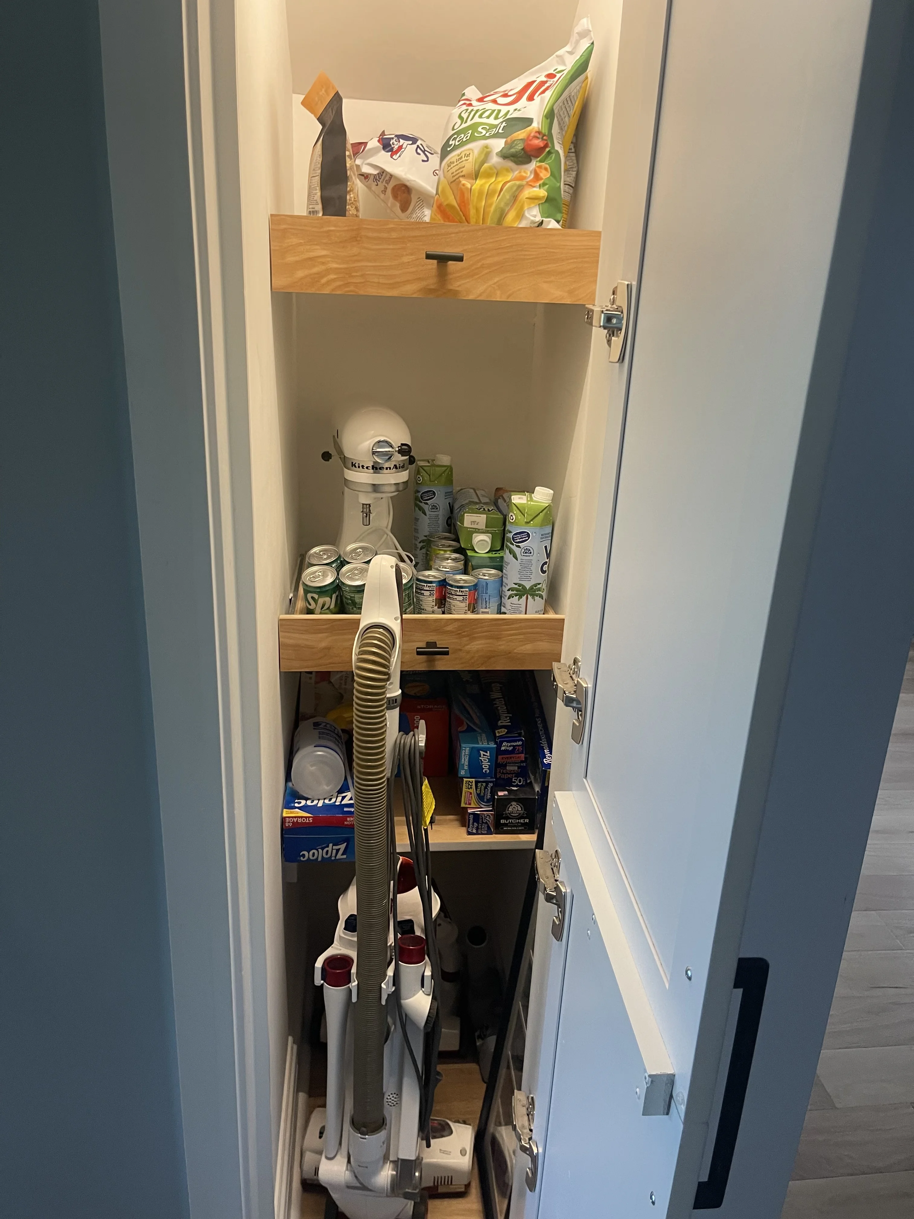 Supply Closet After Custom Shelf by Bleu Ribbon Design & Remodeling